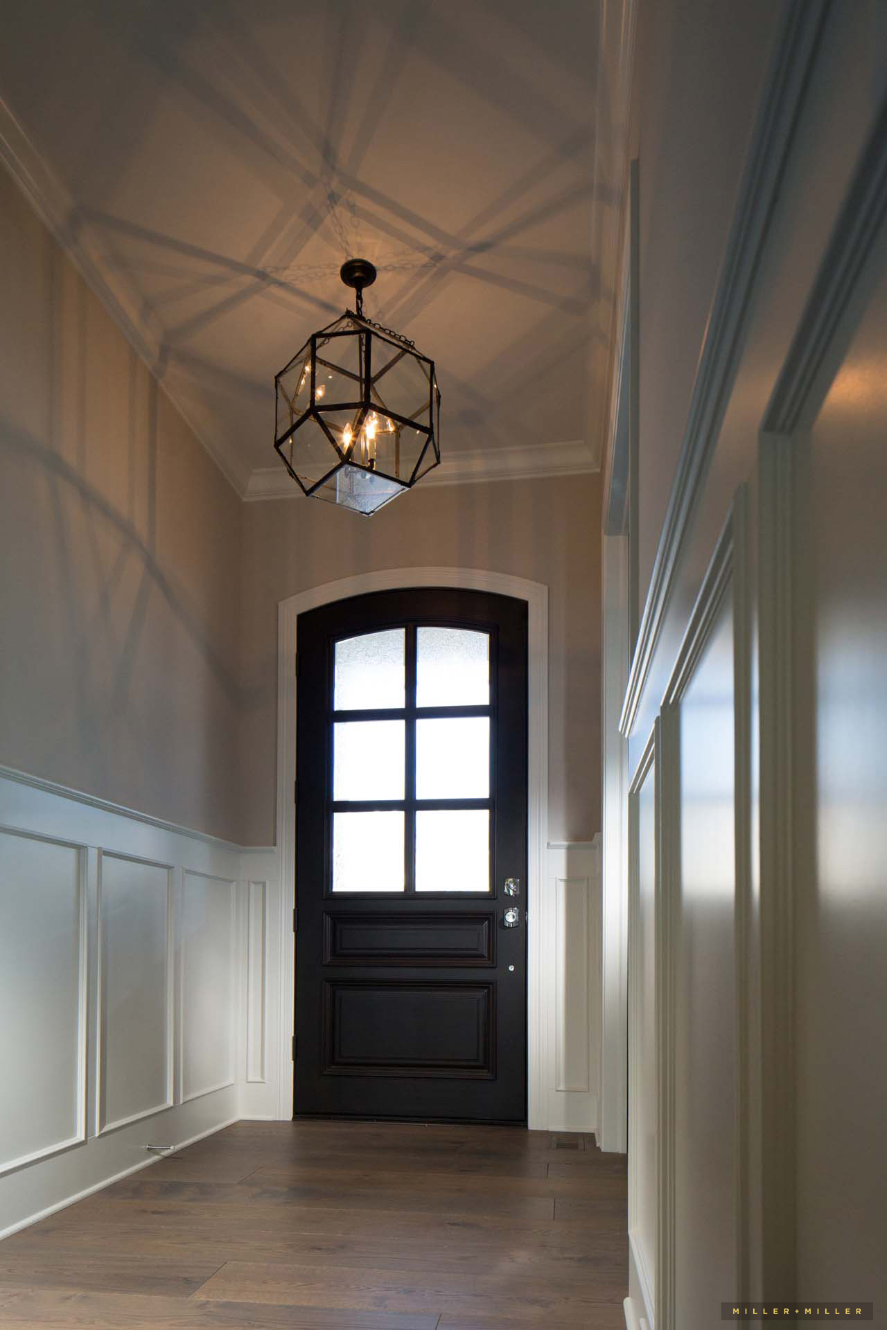 craftsman-glass-wood-front-door-iron-geometric-pendant-fixture
