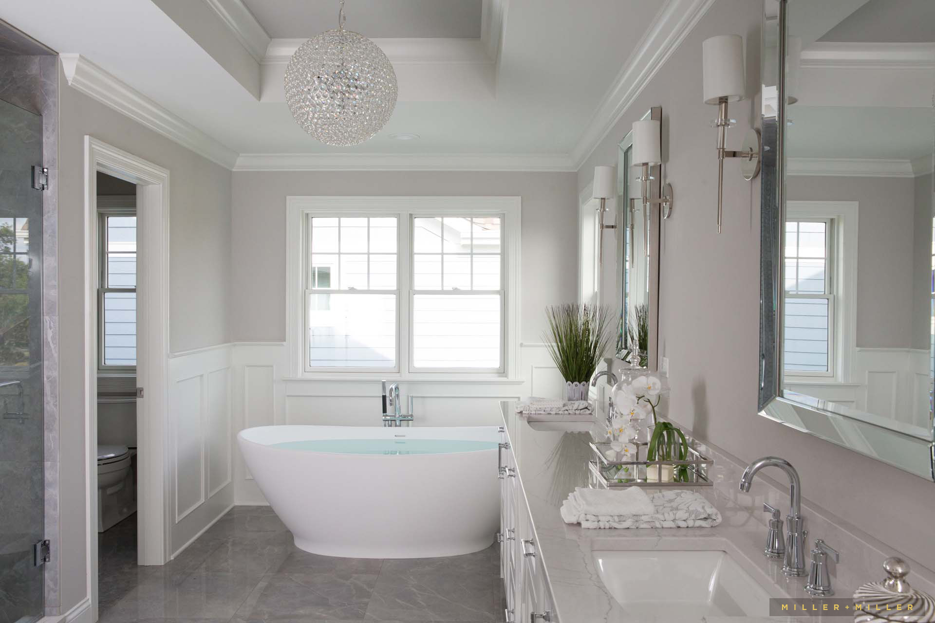 white-gray-quartz-double-sink-vanity-freestanding-tub
