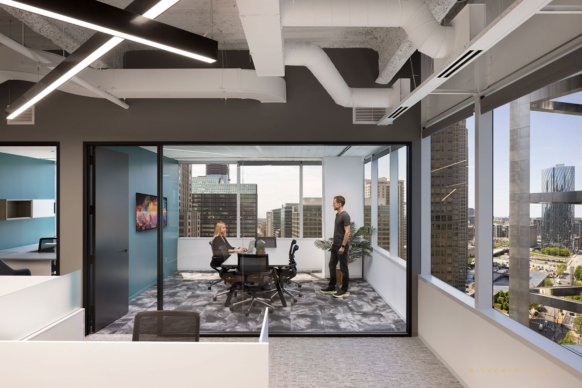 open concept modern glass corner office skyline cubicles
