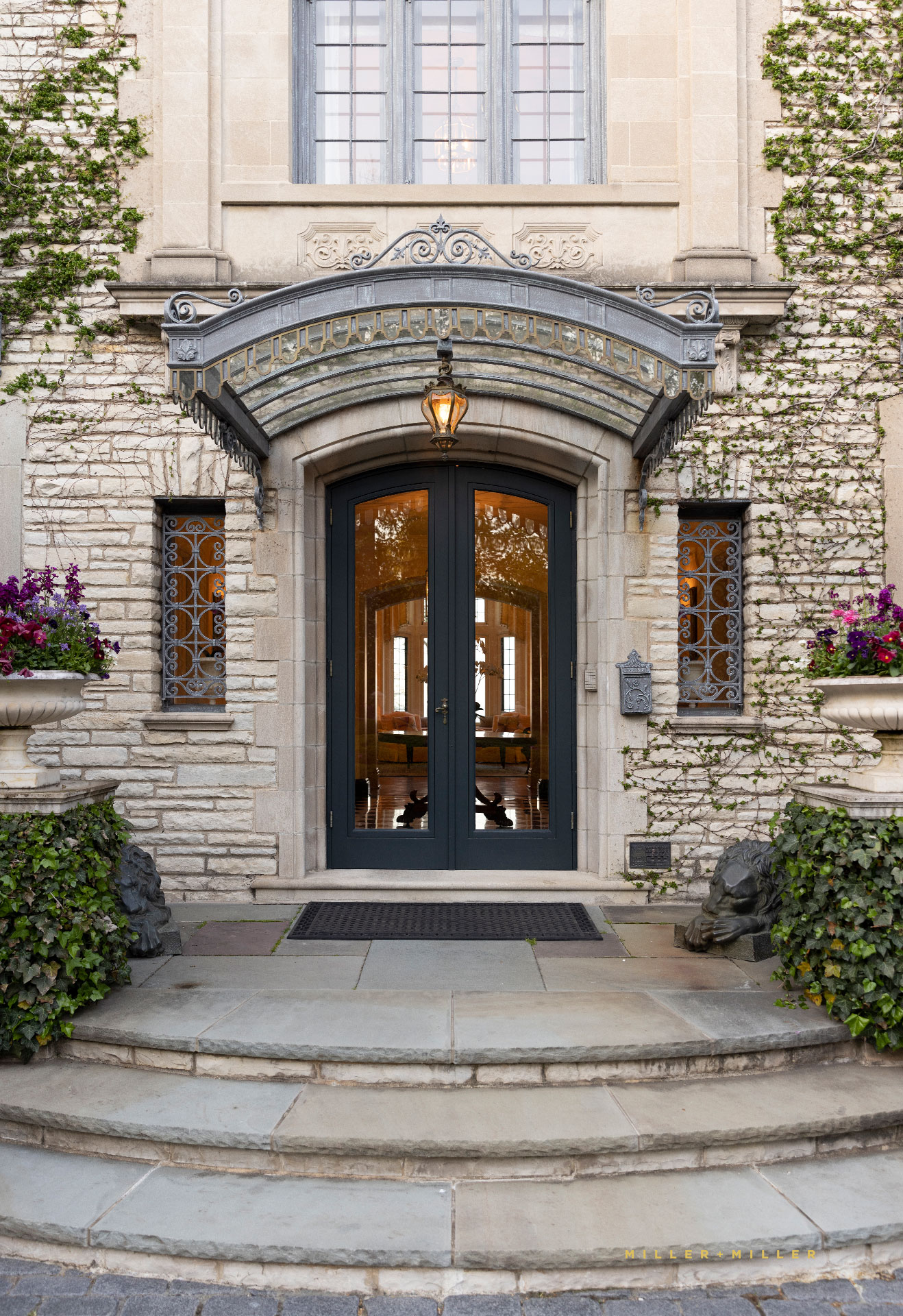 French Normandy Architecture wrought iron ivy luxury estate private residence Exterior Photographers MILLER+MILLER Architectural Photography